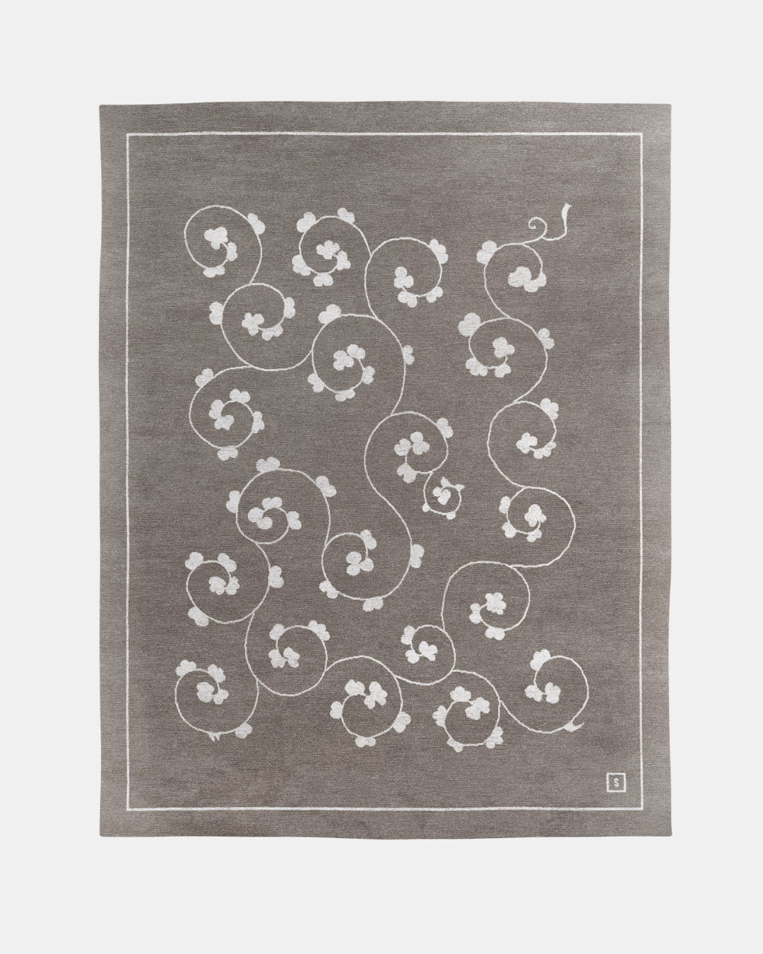 Jardin rug, Edition 03: white scrolling vine and blossom on a warm grey ground, hand-knotted in wool and bamboo silk