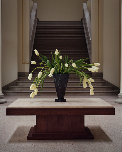 Black Marquina marble vase XL by Studio Vraco styled with white tulips on a wood and travertine table in neoclassical interior